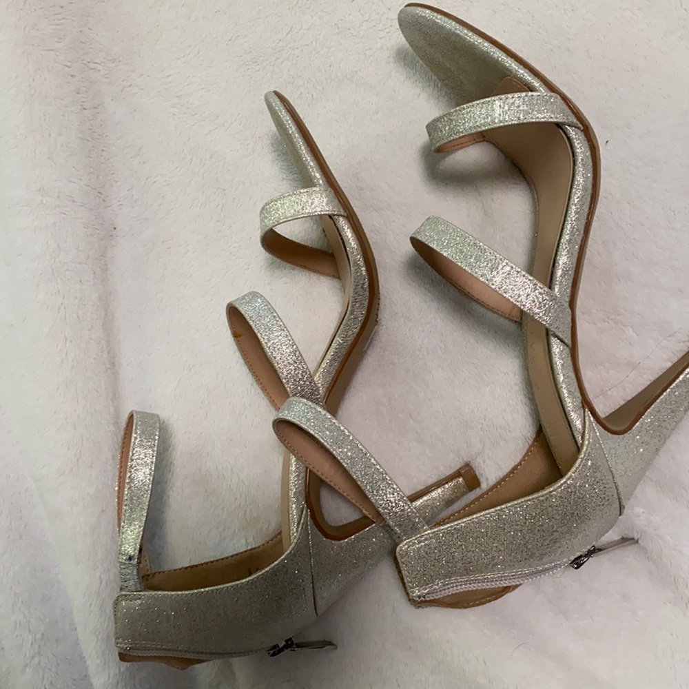silver sparkly high heals! used but are good to wear longer they are very pretty